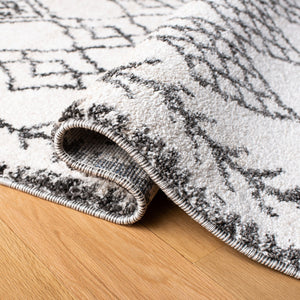 Tunisia 736 Bohemian Power Loomed 100 % Polyproplene Pile Rug Ivory / Black