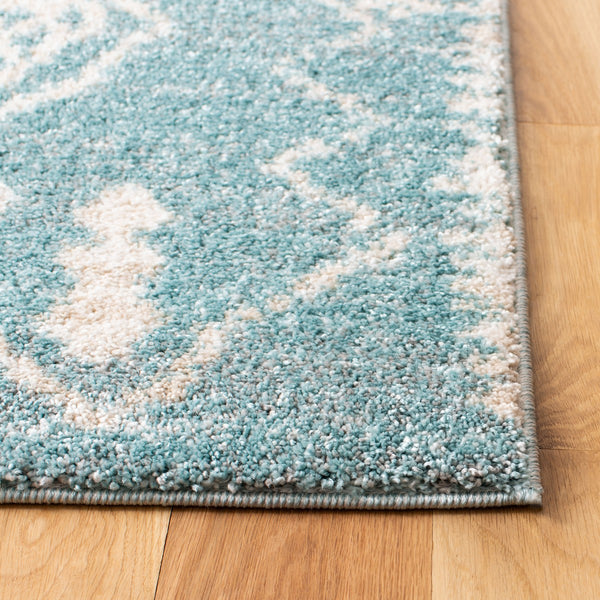 Tunisia 736 Bohemian Power Loomed 100 % Polyproplene Pile Rug Aqua / Ivory