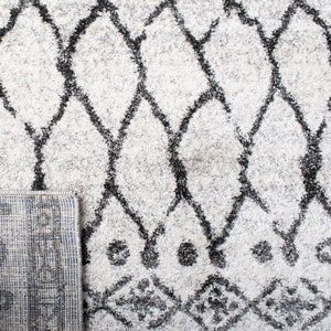 Tunisia 760 Bohemian Power Loomed 100 % Polyproplene Pile Rug Ivory / Black