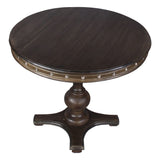 Round Wooden Farmhouse Dining Table with Rivets Accent and Turned Pedestal Base, Dark Brown