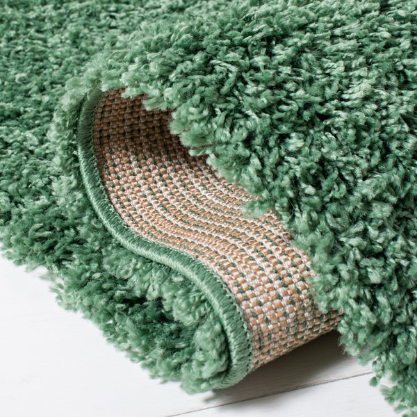 Safavieh Venus Shag 520 Power Loomed 61% Polypropylene/24% Jute/7% Polyester/8% Latex Shag & Flokati Rug VNS520Y-9