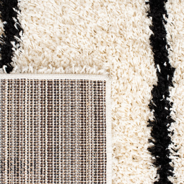 Safavieh Venus Shag 604 Power Loomed 61% Polypropylene/24% Jute/7% Polyester/8% Latex Shag & Flokati Rug VNS604A-9