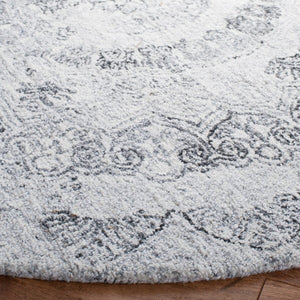 Abstract 145 Contemporary Hand Tufted 80% Polyester, 20% Wool Rug Ivory / Black