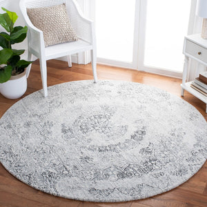 Abstract 145 Contemporary Hand Tufted 80% Polyester, 20% Wool Rug Ivory / Black