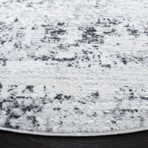 Amelia 700  Contemporary Power Loomed 75% Polypropylene 25% Shrink Polyester Rug Ivory / Grey