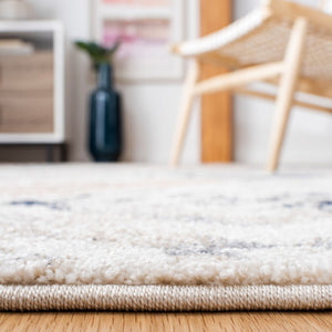 Coppertone 324 Contemporary Power Loomed 95% Polypropylene, 5% Polyester Rug Ivory / Navy