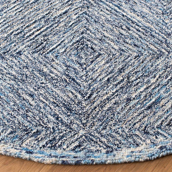 Capri 207  Hand Tufted 100% Wool Pile Rug Ivory / Blue