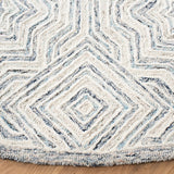 Capri 215  Hand Tufted 100% Wool Pile Rug Beige / Blue