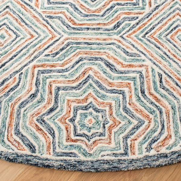 Capri 215  Hand Tufted 100% Wool Pile Rug Blue / Rust