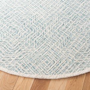 Capri 215  Hand Tufted 100% Wool Pile Rug Blue / Ivory