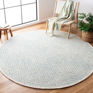Capri 215  Hand Tufted 100% Wool Pile Rug Blue / Ivory