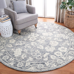 Capri 216  Hand Tufted 100% Wool Pile Rug Blue / Ivory