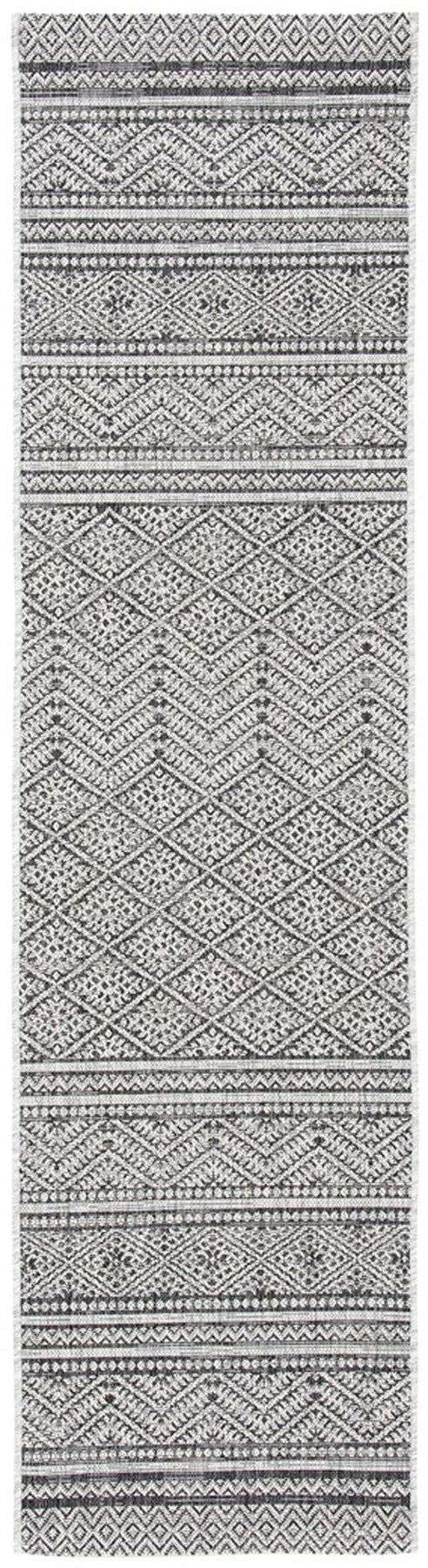 Courtyard  Outdoor Power Loomed 85.4% Polypropylene, 10.4% Polyester, 4.2% Latex Rug Black / Grey