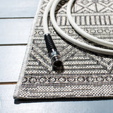 Courtyard  Outdoor Power Loomed 85.4% Polypropylene, 10.4% Polyester, 4.2% Latex Rug Black / Grey