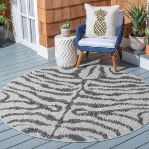Courtyard 8000 Indoor/Outdoor Power Loomed 85.4% Polypropylene, 10.4% Polyester, 4.2% Latex Rug Grey / Black