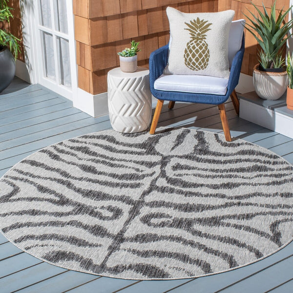 Courtyard 8000 Indoor/Outdoor Power Loomed 85.4% Polypropylene, 10.4% Polyester, 4.2% Latex Rug Grey / Black