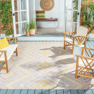 Courtyard 8000 Indoor/Outdoor Power Loomed 85.4% Polypropylene, 10.4% Polyester, 4.2% Latex Rug Pink / Gold