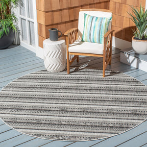 Courtyard  Outdoor Power Loomed 85.4% Polypropylene, 10.4% Polyester, 4.2% Latex Rug Black / Grey