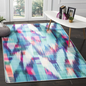 Daytona 118  Power Loomed Polyester Pile Rug Turquoise / Fuchsia