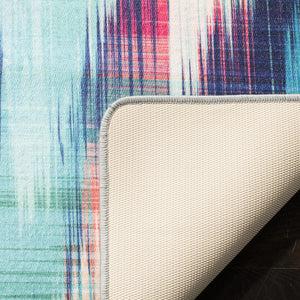 Daytona 118  Power Loomed Polyester Pile Rug Turquoise / Fuchsia