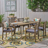 Casa Acacia Patio Dining Set, 6-Seater, 70" Oval Table with Carved Legs, Gray Finish, Dark Gray Outdoor Cushions Noble House