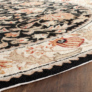 Easy Care Gentry  Hand Hooked Polypropylene Rug Black / Ivory