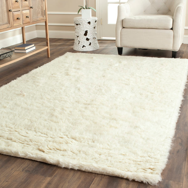 Safavieh Flokati FLK150 Hand Tufted Rug
