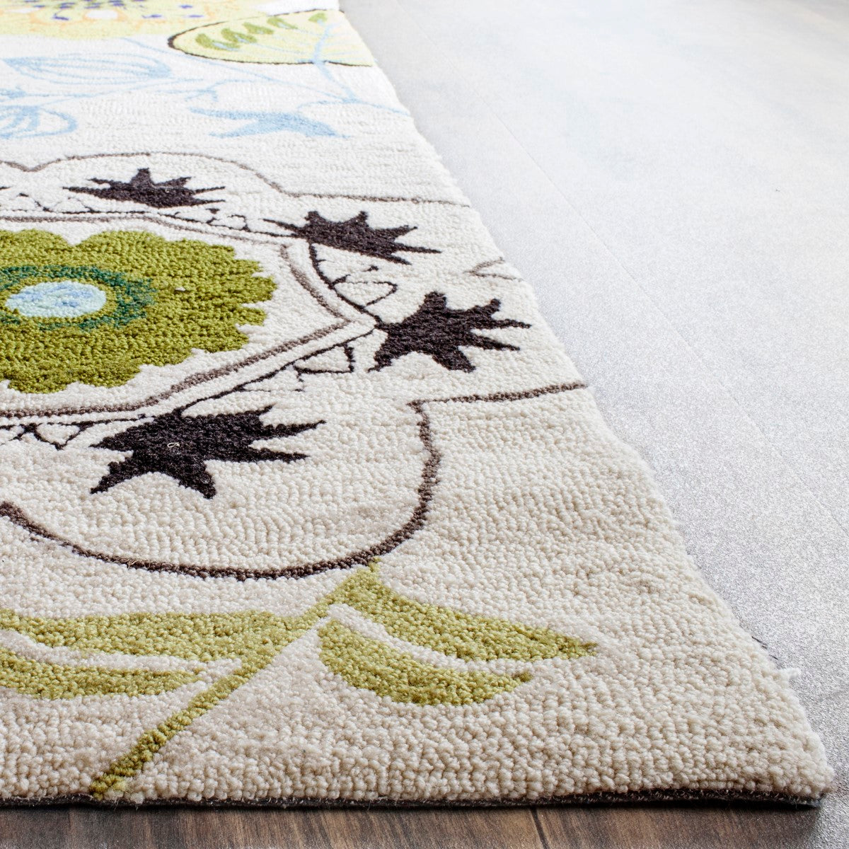Four Seasons Hand-Hooked Indoor-Outdoor Rug - Vibrant Textile-Inspired