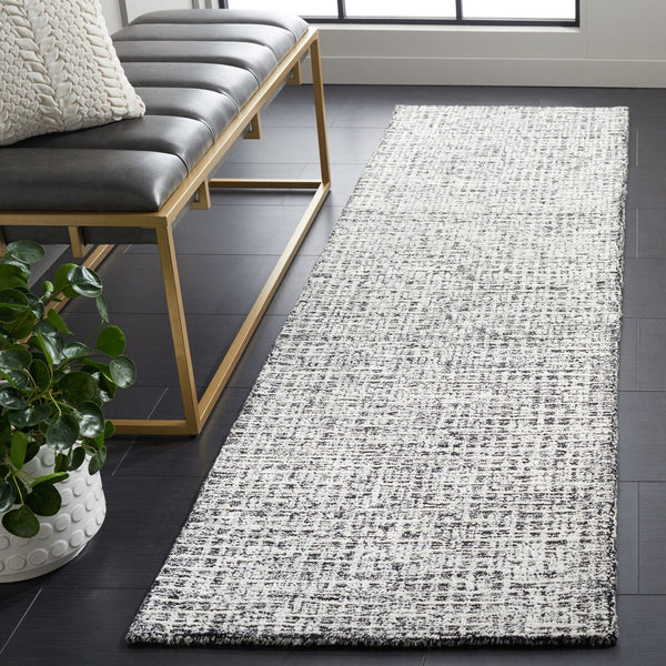 Safavieh Glamour 601 Modern Hand Tufted Rug Black / Ivory GLM601Z-8