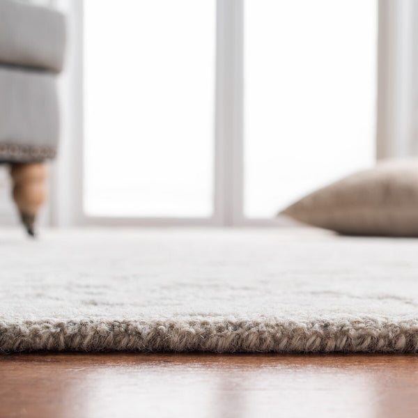 Glamour 651  Hand Tufted 100% Wool Pile Rug Beige / Ivory