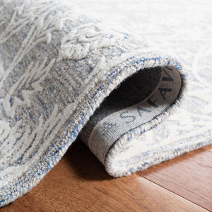 Glamour 651  Hand Tufted 100% Wool Pile Rug Blue / Ivory