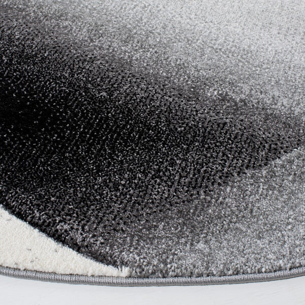 Safavieh Hollywood 713 Power Loomed 100% Polypropylene Contemporary Rug HLW713P-9