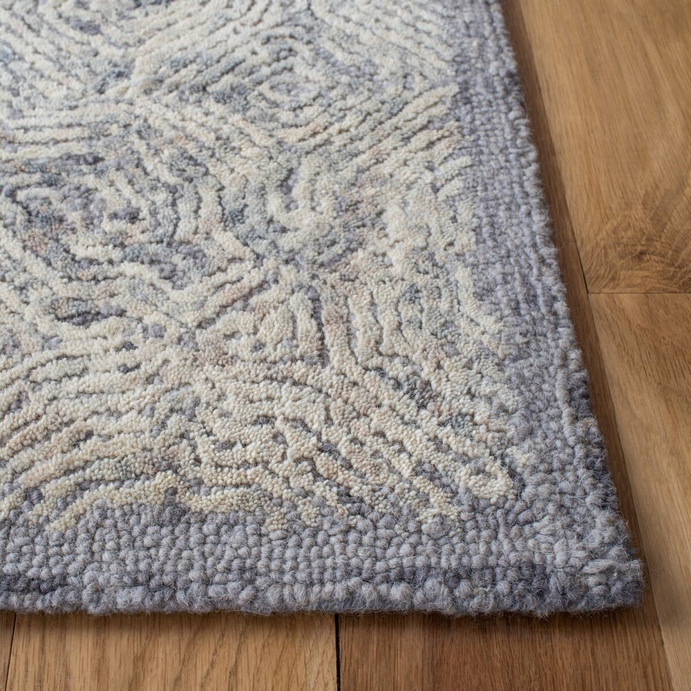 Safavieh Ikat 506 Hand Tufted Wool Contemporary Rug IKT506G-9