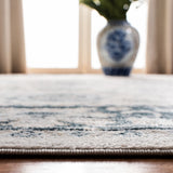 Isabella 940 Transitional Power Loomed Polypropylene Pile Rug Cream / Navy