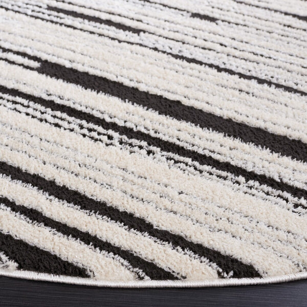 Safavieh Melody 116 Modern Power Loomed Rug Ivory / Black MEL116A-9