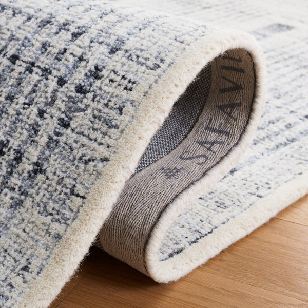 Metro Hand Tufted Pet Yarn and Wool Rug with Luxurious Texture for Elegant Home Decor Style