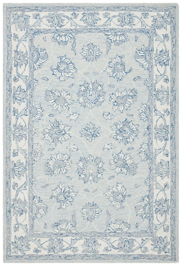Micro-Loop 536 Contemporary Hand Tufted 100% Wool Pile Rug Light Blue / Ivory