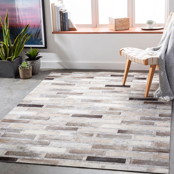 Medora MOD-1023 Rustic Hair On Hide, Viscose, Wool Rug MOD1023-913 Light Gray, Dark Brown, Ivory, Black, Taupe, Medium Gray 60% Hair On Hide, 20% Viscose, 20% Wool 9' x 13'