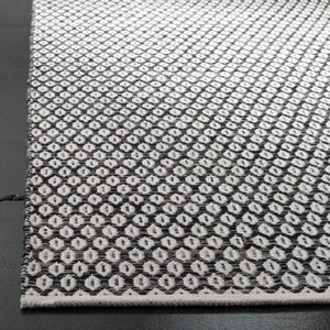 Montauk Hand Woven Cotton Rug - Luxurious Indian Craftsmanship for Elegant Home Decor and Comfort