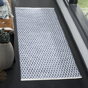 Montauk Hand Woven Cotton Rug - Luxurious Indian Craftsmanship for Elegant Home Decor and Comfort