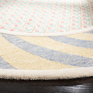 Safavieh Novelty NOV108 Hand Tufted Rug