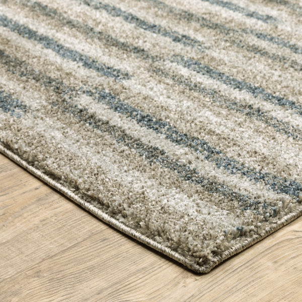 Oriental Weavers Alton 5502D Industrial/Modern & Contemporary Striped Polyester Indoor Area Rug Teal/ Grey 6'7" x 9'6" A5502D200290ST