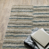 Oriental Weavers Alton 5502D Industrial/Modern & Contemporary Striped Polyester Indoor Area Rug Teal/ Grey 6'7" x 9'6" A5502D200290ST