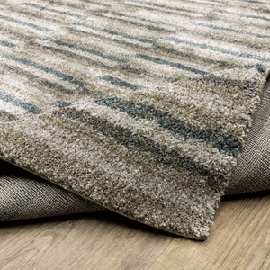 Oriental Weavers Alton 5502D Industrial/Modern & Contemporary Striped Polyester Indoor Area Rug Teal/ Grey 6'7" x 9'6" A5502D200290ST