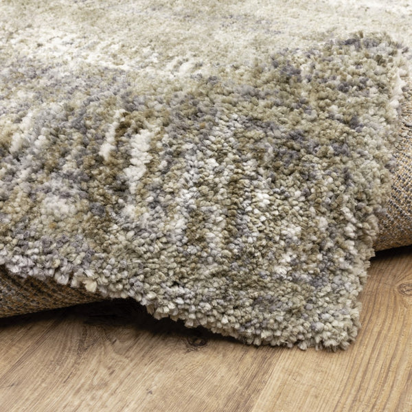 Oriental Weavers Aspen 530J9 Shag/Contemporary Abstract Polyester Indoor Area Rug Grey/ Ivory 6'7" x 9'6" A530J9200290ST