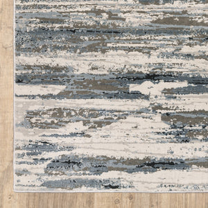 Oriental Weavers Caravan 750W8 Contemporary/Industrial Abstract Polyester Indoor Area Rug Blue/ Grey 9'10" x 12'10" C750W8300394ST