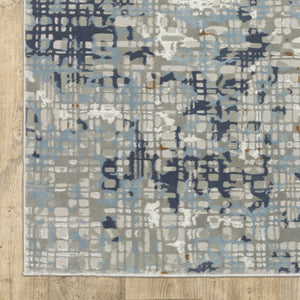 Oriental Weavers Easton 011E3 Contemporary/Industrial Abstract Polypropylene, Polyester Indoor Area Rug Blue/ Ivory 9'10" x 12'10" E011E3300394ST