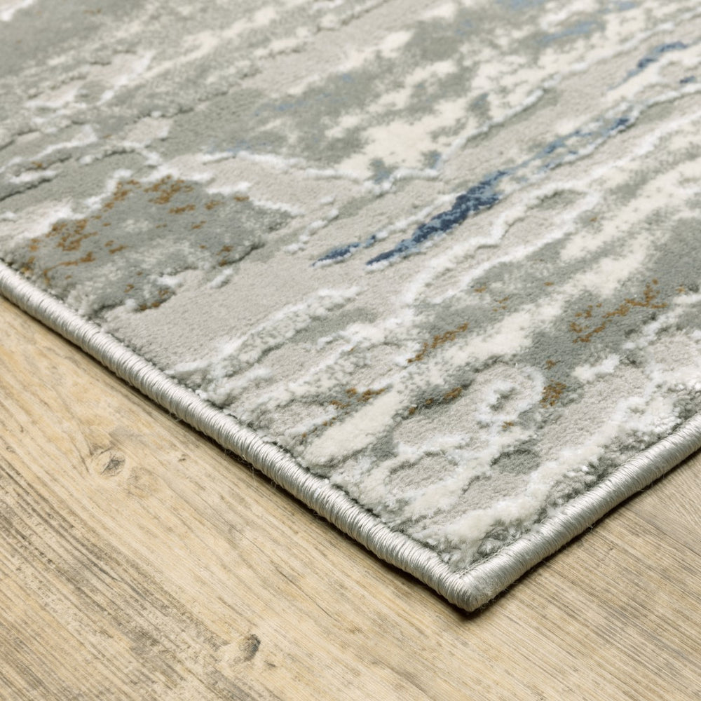 Oriental Weavers Easton 012E3 Contemporary/Industrial Abstract Polypropylene, Polyester Indoor Area Rug Grey/ Blue 9'10" x 12'10" E012E3300394ST