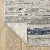 Oriental Weavers Easton 012E3 Contemporary/Industrial Abstract Polypropylene, Polyester Indoor Area Rug Grey/ Blue 9'10" x 12'10" E012E3300394ST