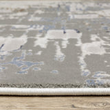 Oriental Weavers Easton 8111X Industrial/Contemporary Abstract Polypropylene, Polyester Indoor Area Rug Grey/ Blue 9'10" x 12'10" E8111X300394ST